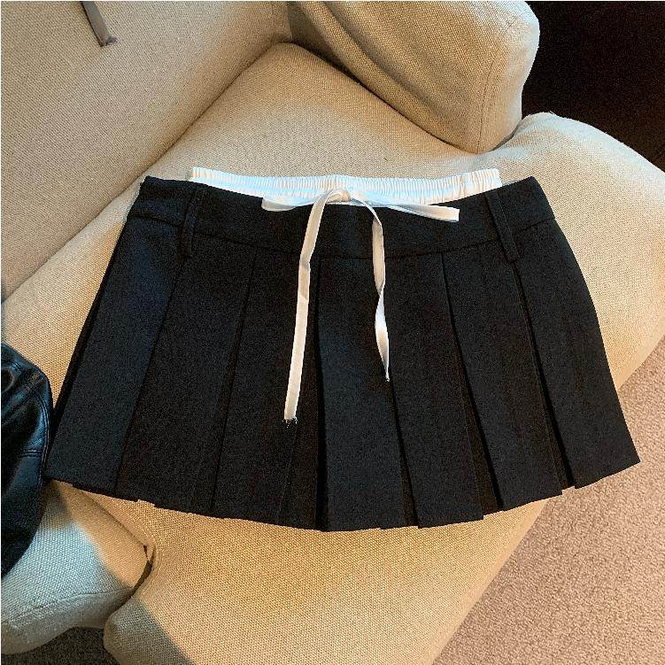 YOUR PROBLEM BLACK MINI SKIRT