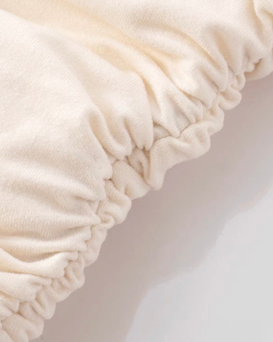 CUE THE MUSIC BACKLESS METAL HEART HALTERNECK TOP