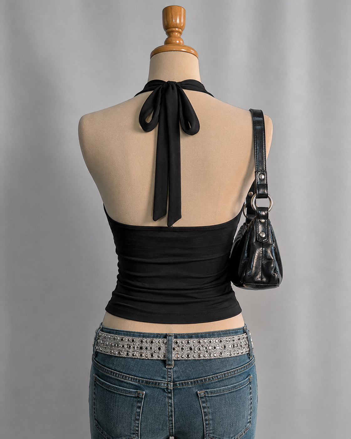 TONIGHT’S FORECAST LACE TRIM LUXE BLACK HALTERNECK TOP”