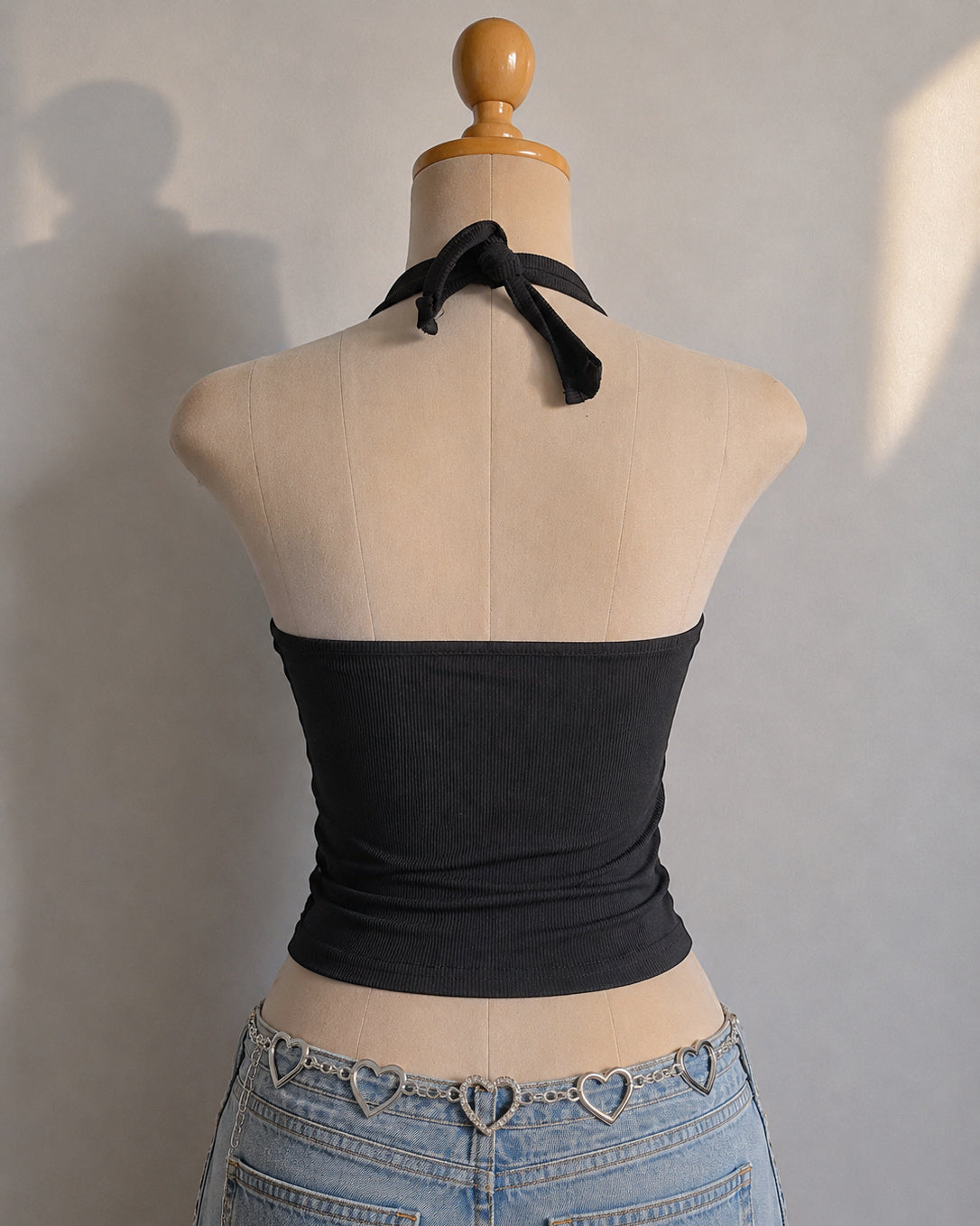 RESIST THE MADNESS METAL HEART RIBBED BLACK HALTERNECK TOP