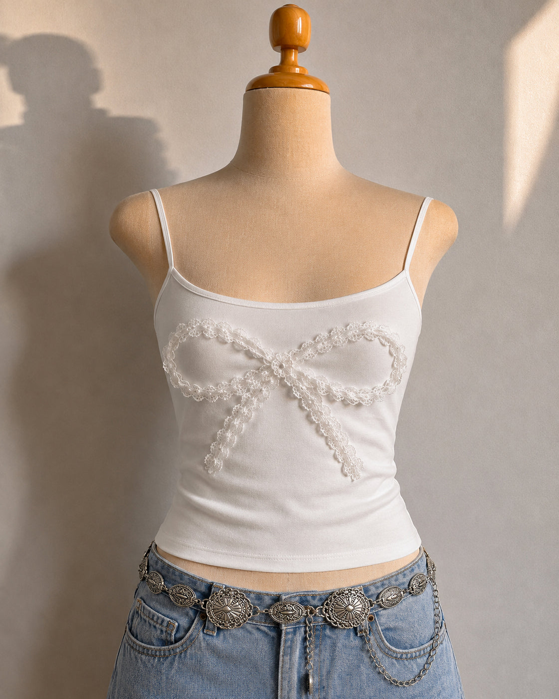 SWEET MEETS SAVAGE BOW DETAIL WHITE CAMI TOP