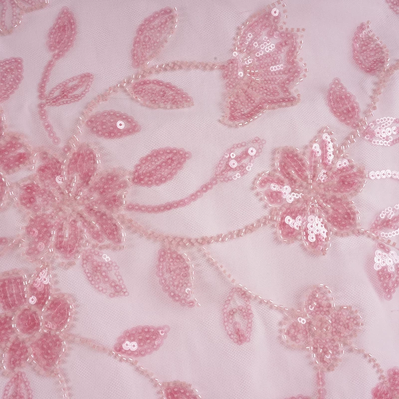 PRETTY PLEASE EMBROIDERED TIE-BACK HALTERNECK TOP