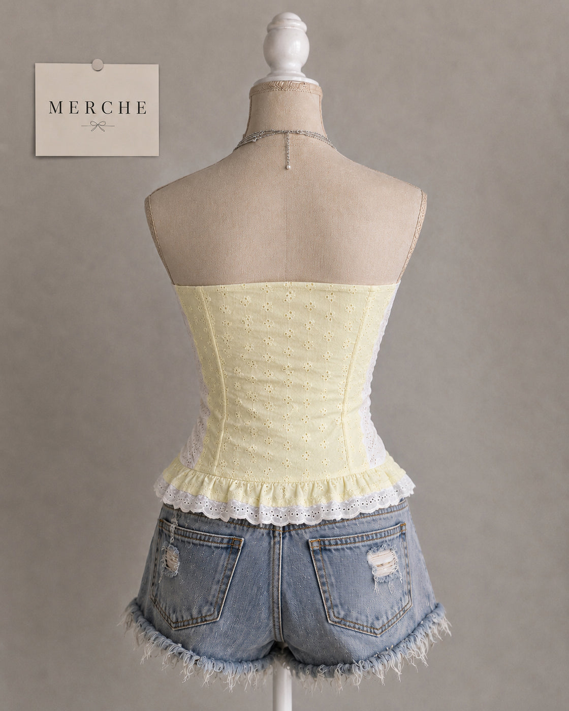 GATEKEEP THIS EYELET BUTTER YELLOW BUSTIER TOP