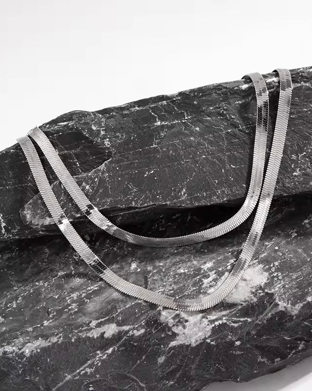 LOVE POTION SILVER KNOTTED CHAIN NECKLACE