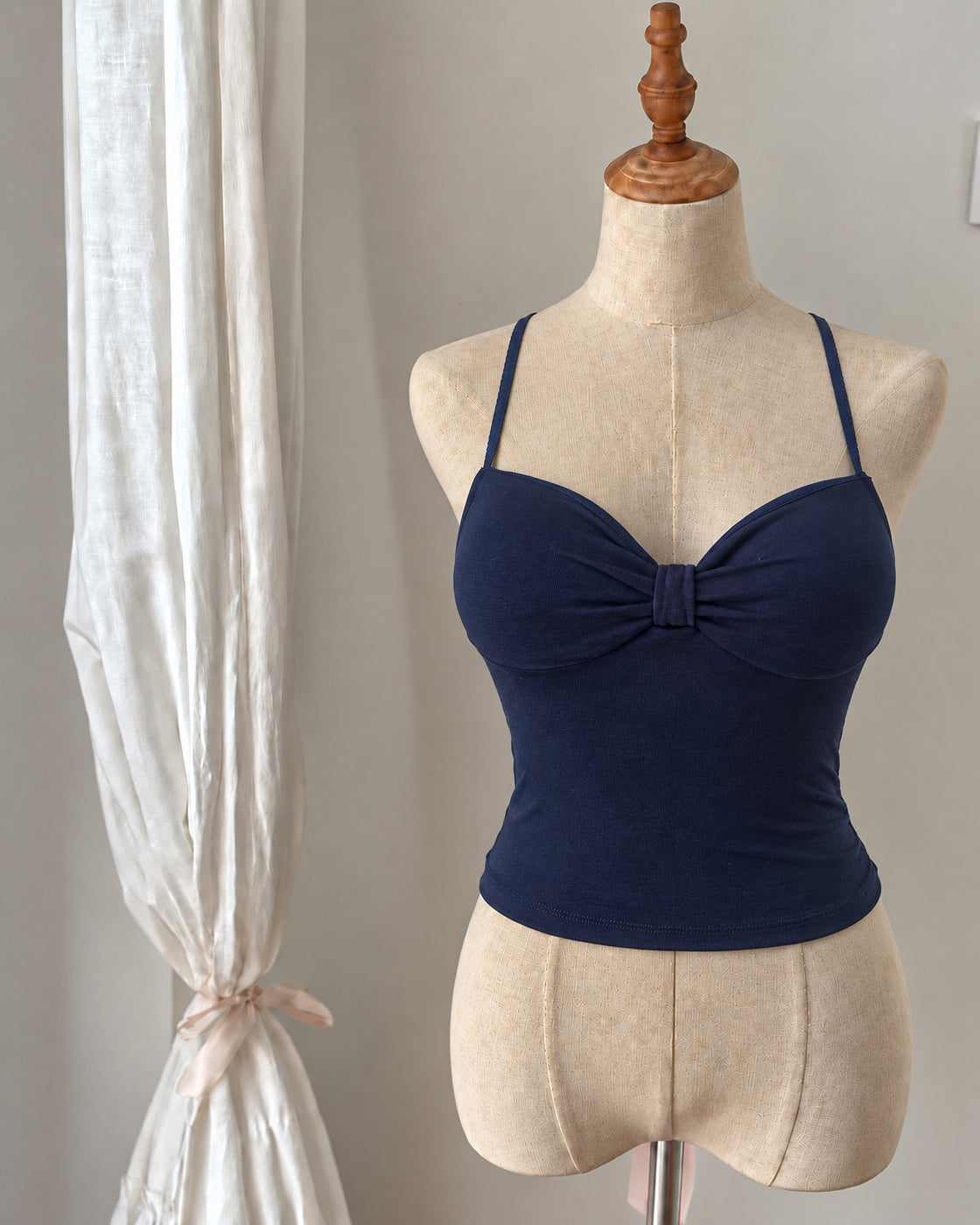RAVE WITH ME PADDED CROSSBACK NAVY TOP