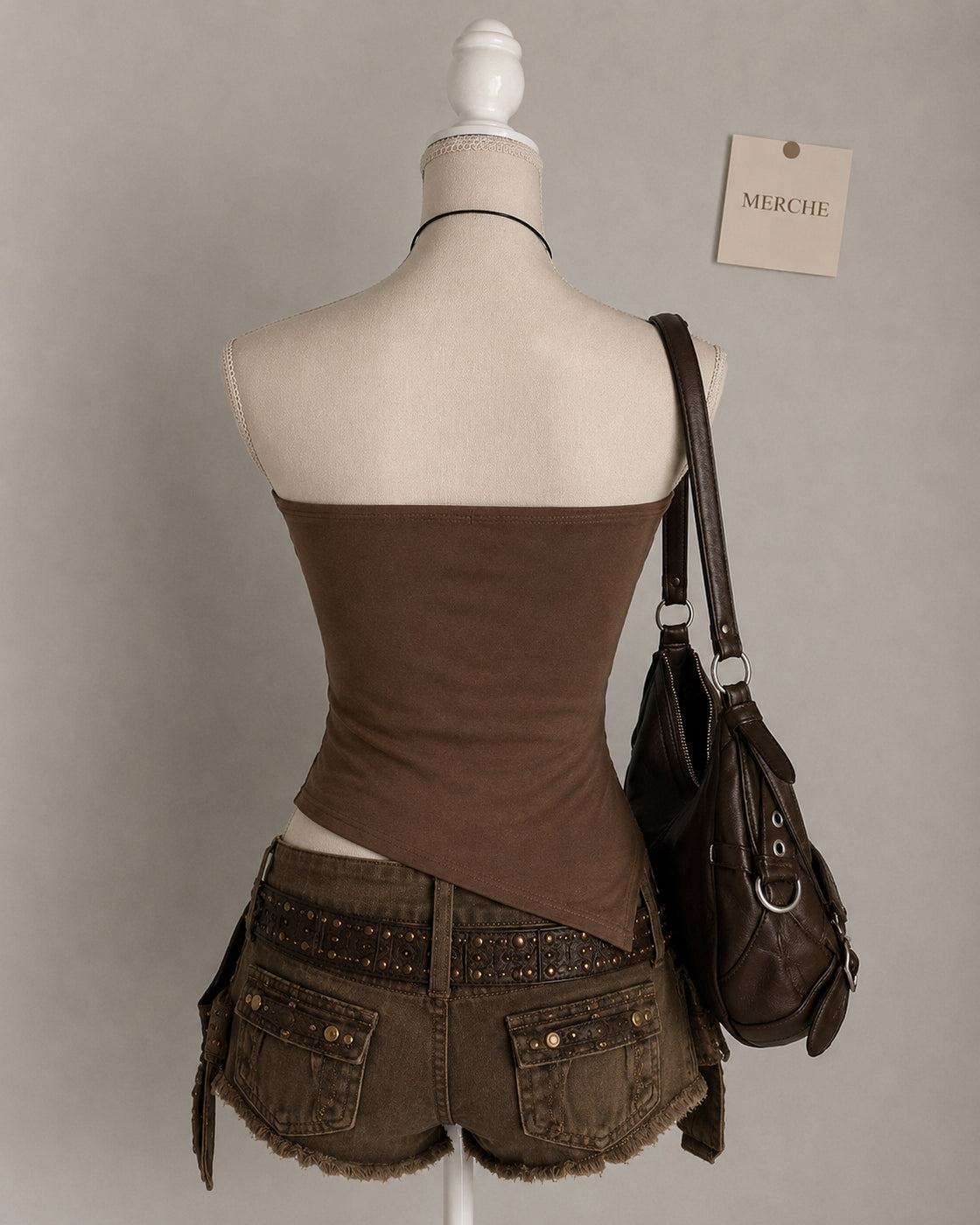 SECRETS OUT ASYMMETRICAL EMBROIDERED BANDEAU TOP
