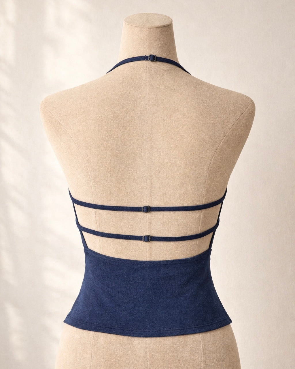 SERVING INSANITY FAUX DENIM HALTERNECK TOP