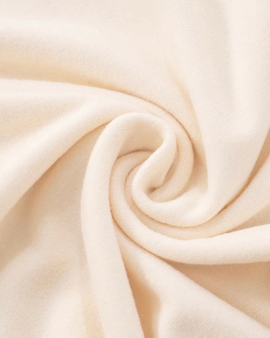 CUE THE MUSIC BACKLESS METAL HEART HALTERNECK TOP