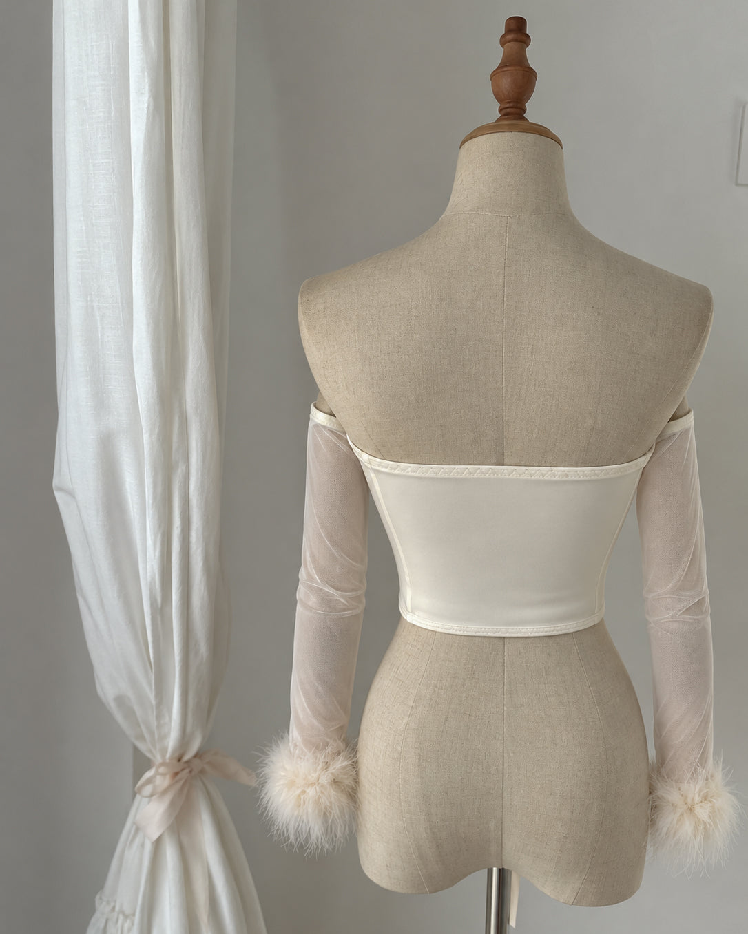 FAMOUS PEOPLE FAUX FUR CORSETED SLASH TOP