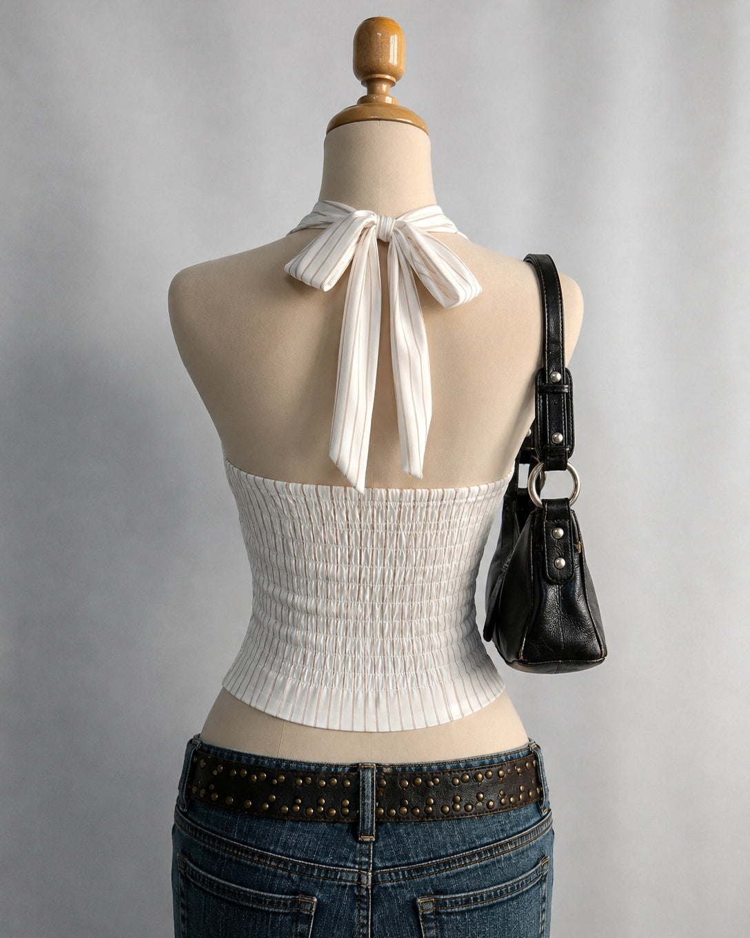 COMMITMENT ISSUES STRIPED BOW HALTERNECK TOP