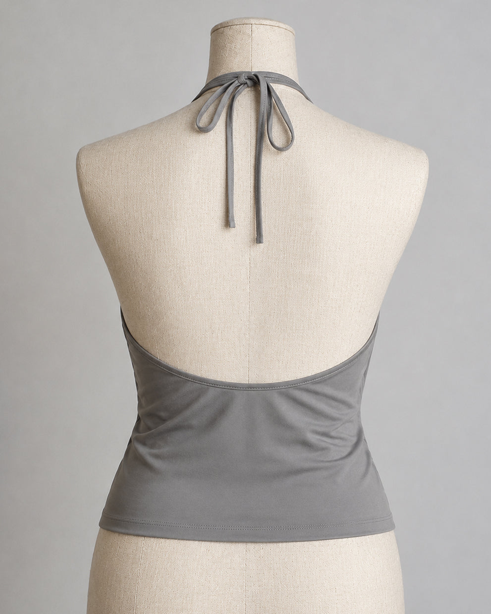 HIGH-SCHOOL DRAMA COWL BUTTON DETAILED DRAPE HALTERNECK TOP