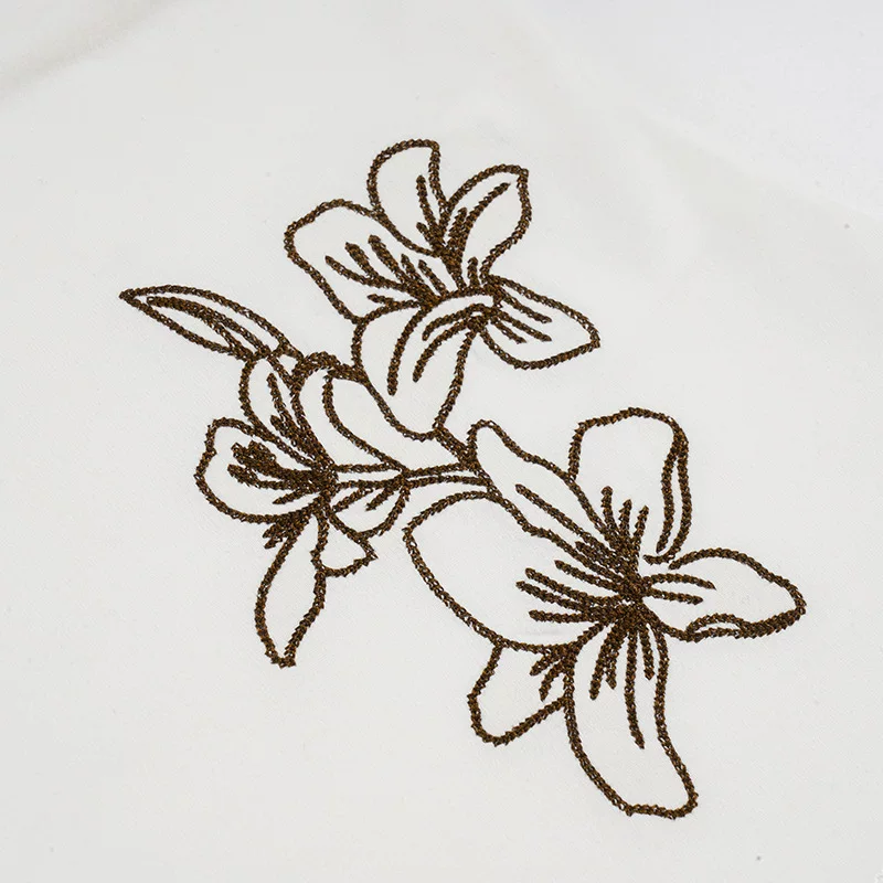BEACH BABE TWISTED STRAPLESS EMBROIDERED WHITE TUBE TOP