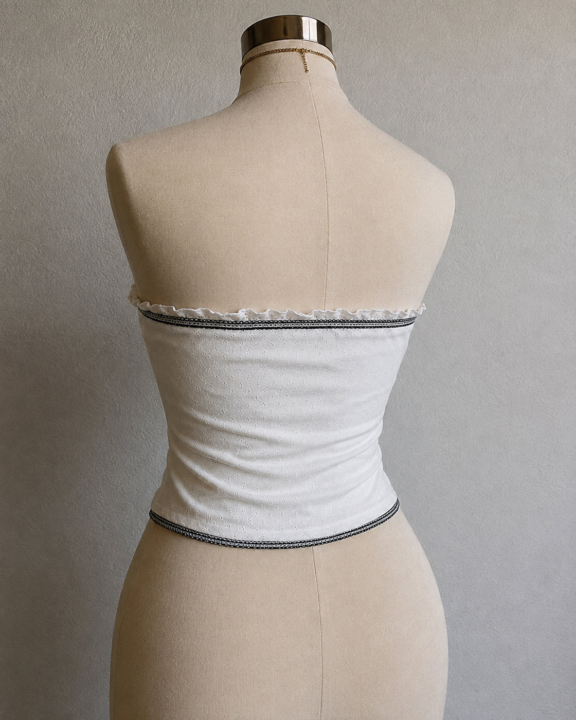 SHE HAS RANGE EYELET RUFFLE BANDEAU TOP