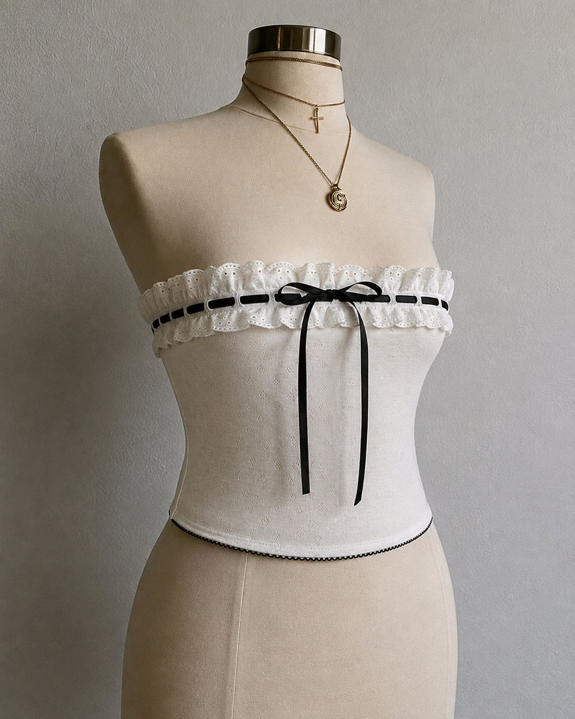 SHE HAS RANGE EYELET RUFFLE BANDEAU TOP