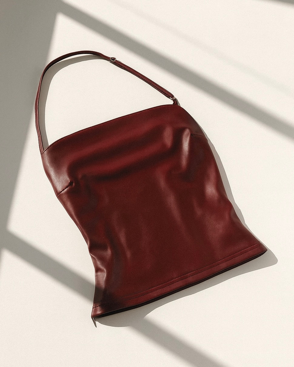 YOU LOVED ME FAUX LEATHER LUXE HALTERNECK TOP