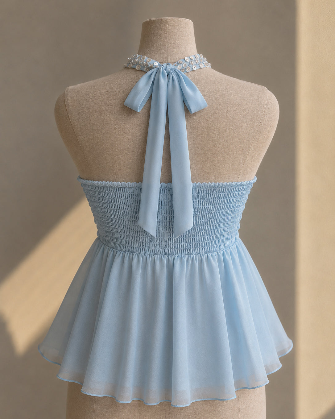 PRETTY TWICE PADDED SHIMMER DETAIL BOW BLUE HALTERNECK TOP