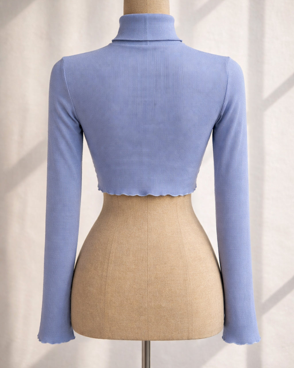 SHE’S A PLAYER CUT-OUT RIBBED BLUE TOP