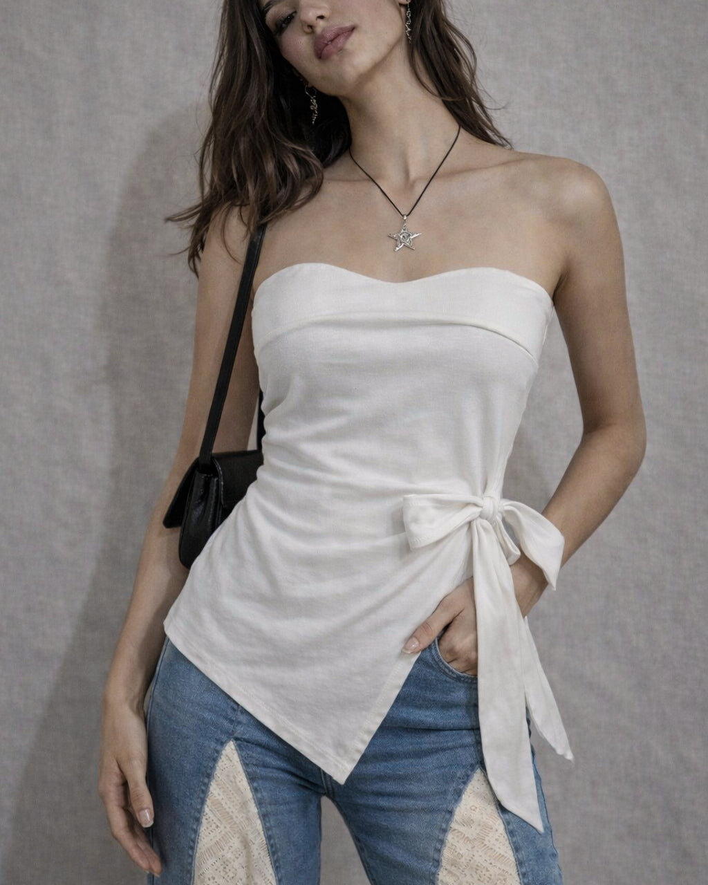 SLIGHTLY TOXIC PADDED BOW-TIE ASYMMETRICAL WHITE BANDEAU TOP