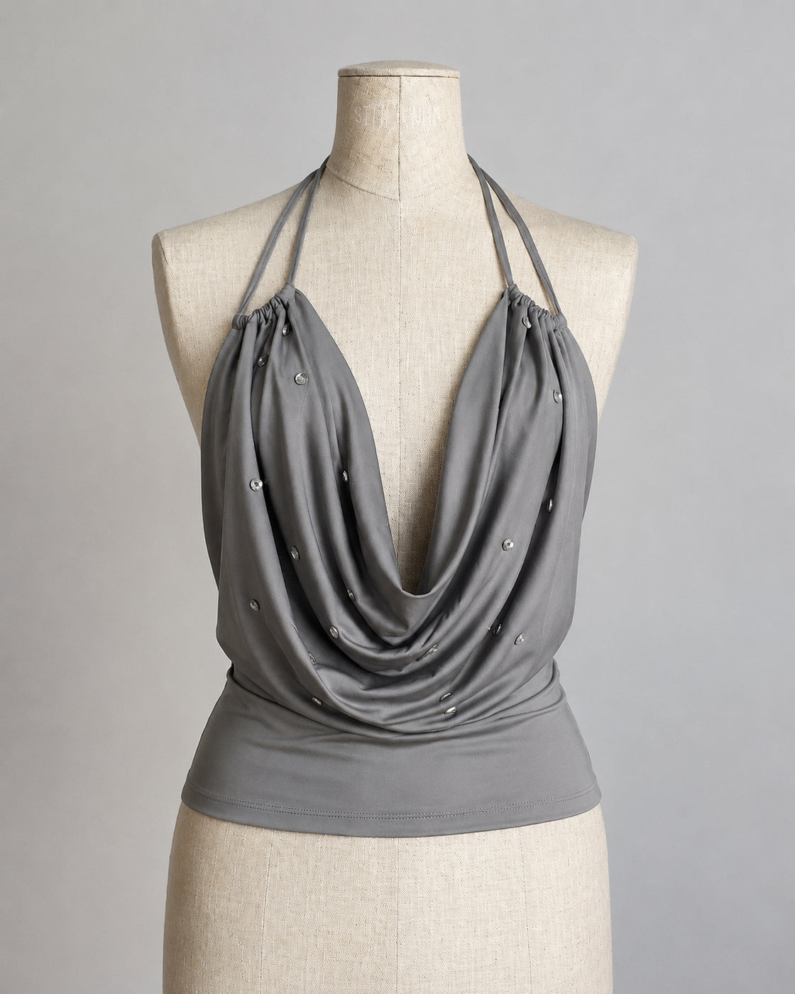 HIGH-SCHOOL DRAMA COWL BUTTON DETAILED DRAPE HALTERNECK TOP