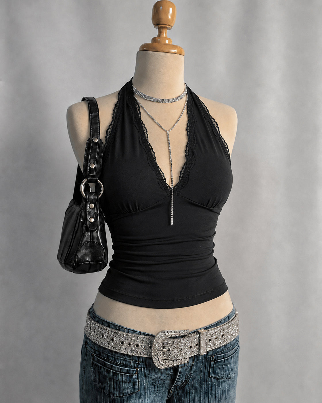 TONIGHT’S FORECAST LACE TRIM LUXE BLACK HALTERNECK TOP”