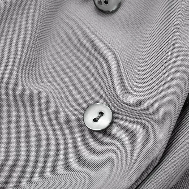 HIGH-SCHOOL DRAMA COWL BUTTON DETAILED DRAPE HALTERNECK TOP